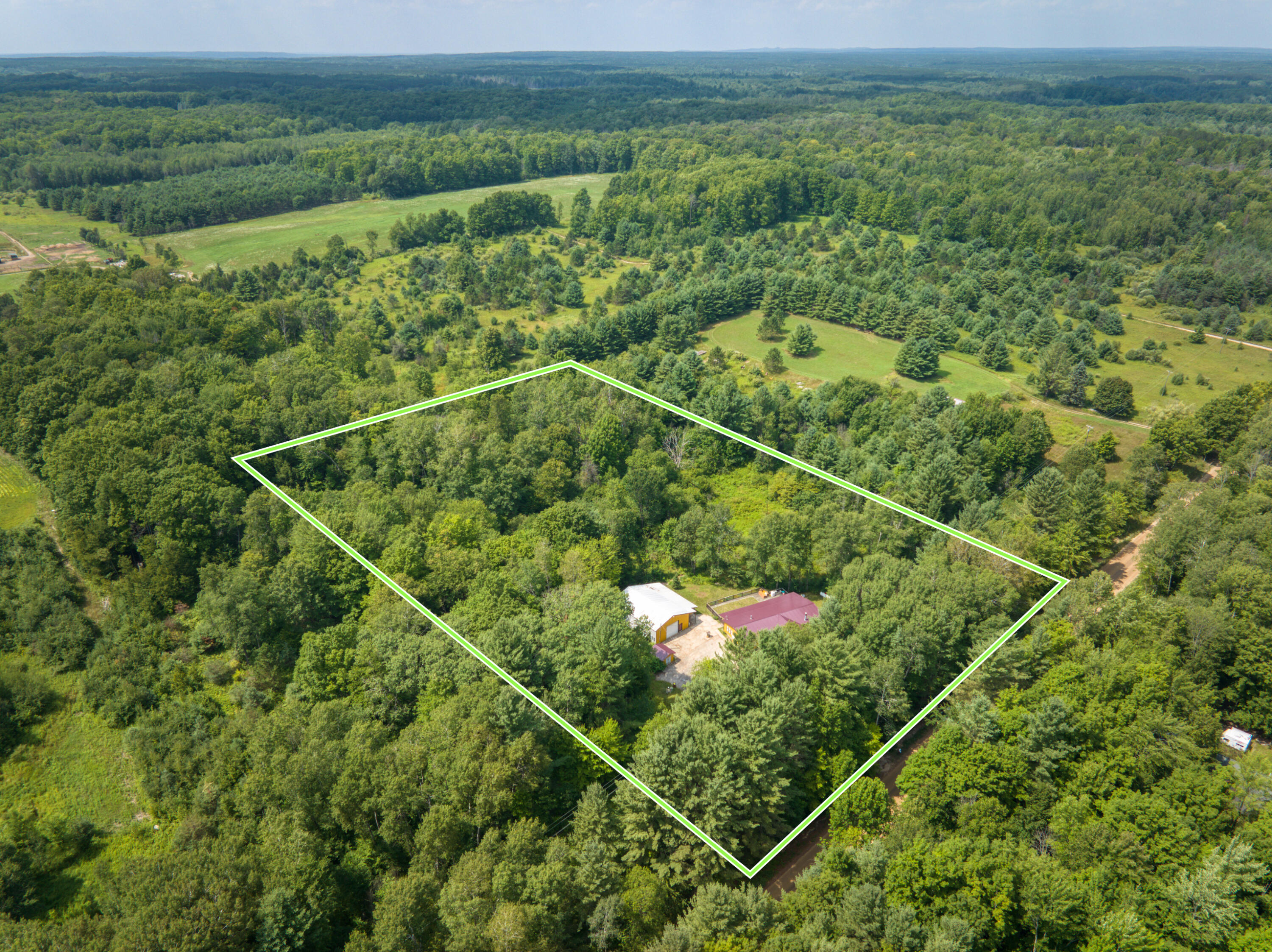 8271 Lakola Road Tustin, MI 49688 - Photo 48 of 52 DJI_20250721041851_0267_D_54