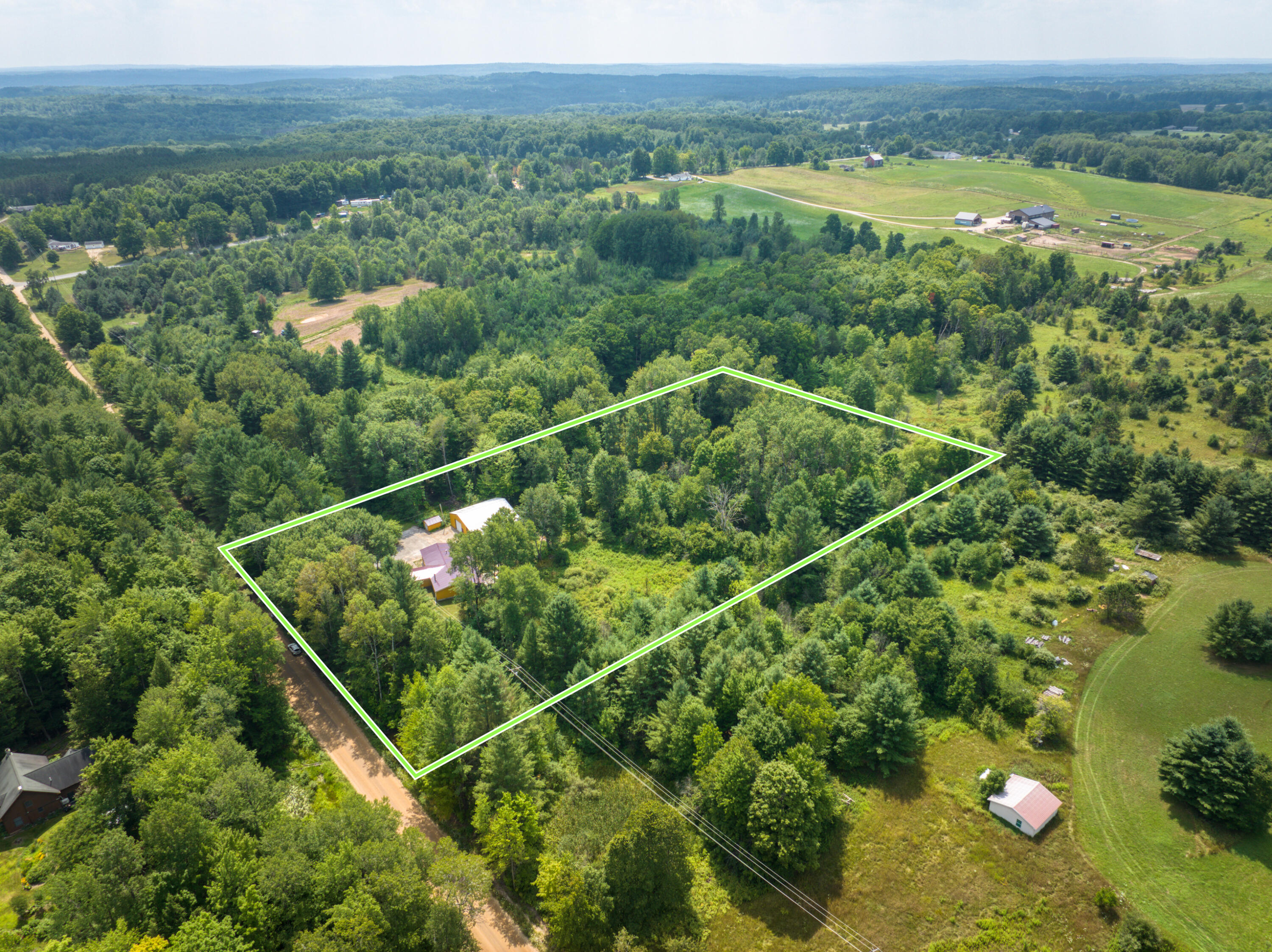 8271 Lakola Road Tustin, MI 49688 - Photo 49 of 52 DJI_20250721041921_0272_D_55