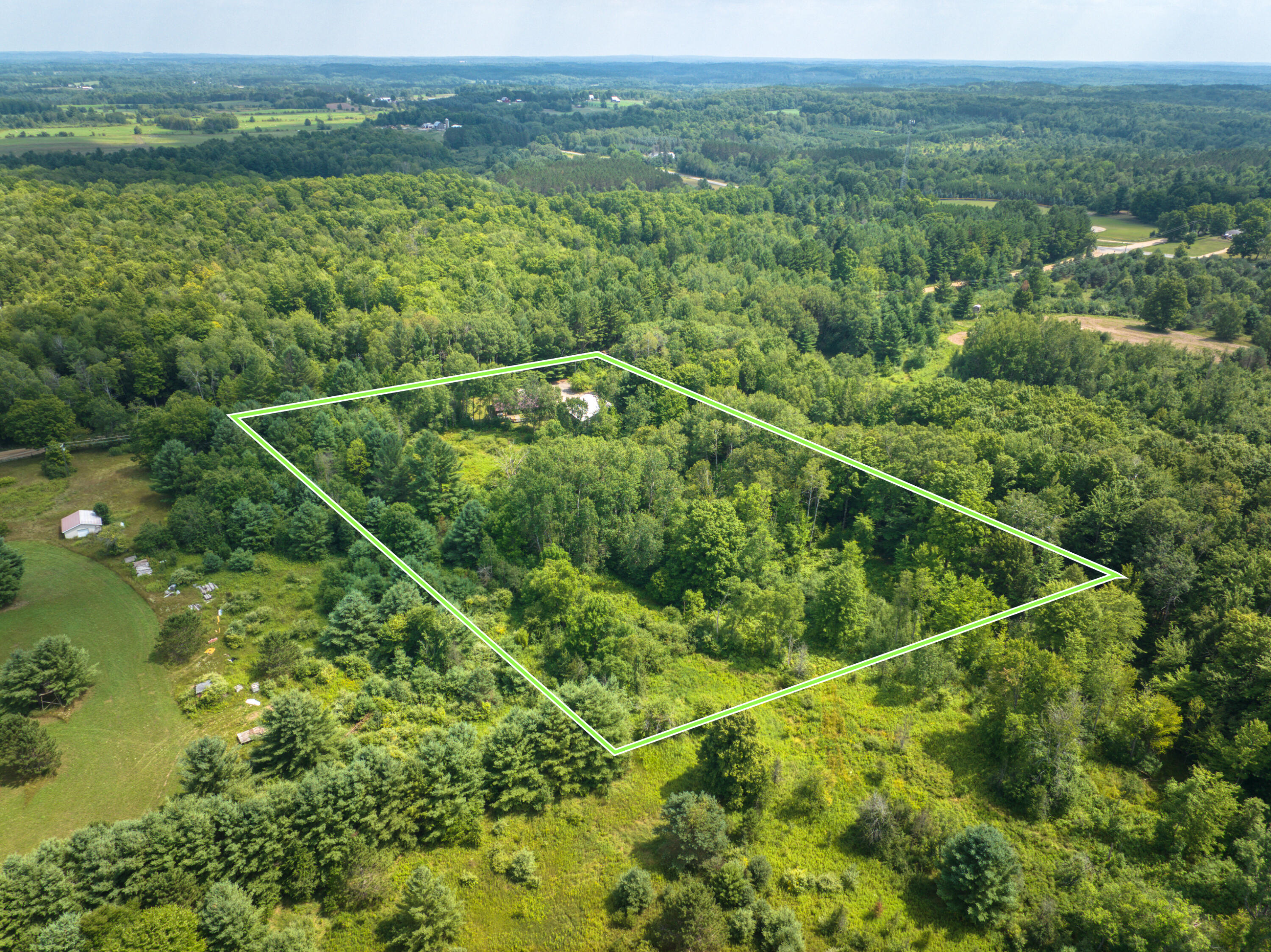 8271 Lakola Road Tustin, MI 49688 - Photo 50 of 52 DJI_20250721042028_0277_D_56