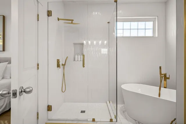 a view of a balcony with wooden chairs