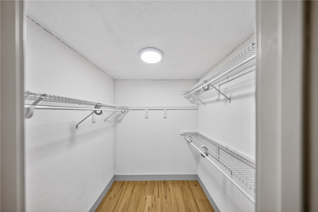 304 Lakeside Drive Seneca, SC 29672 - Photo 29 of 49 Functional closet with ample storage solutions, complete with wire shelving and hanging rods.