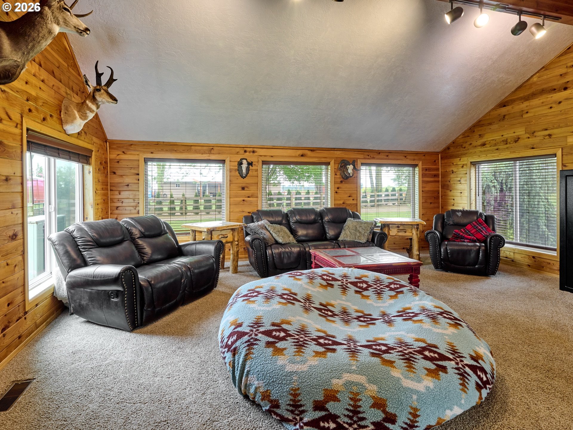 9293 Broadacres Road Northeast Aurora, OR 97002 - Photo 14 of 48 a living room with furniture and a large window
