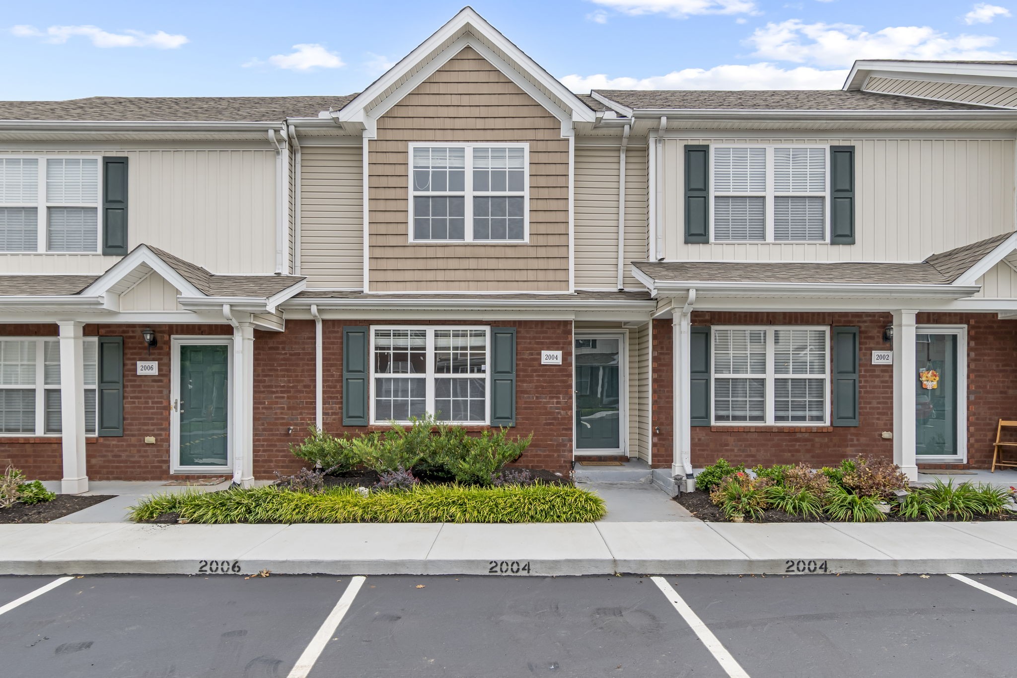 front view of a house and a garden