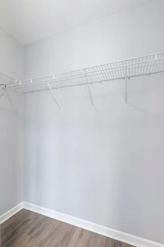 a view of a room with racks on the wall