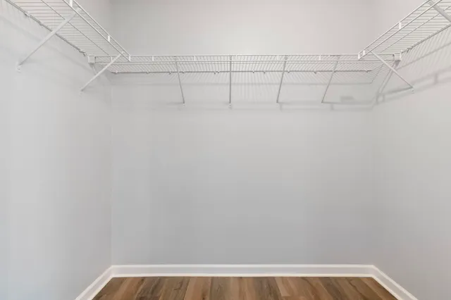 a view of a room with racks on the wall