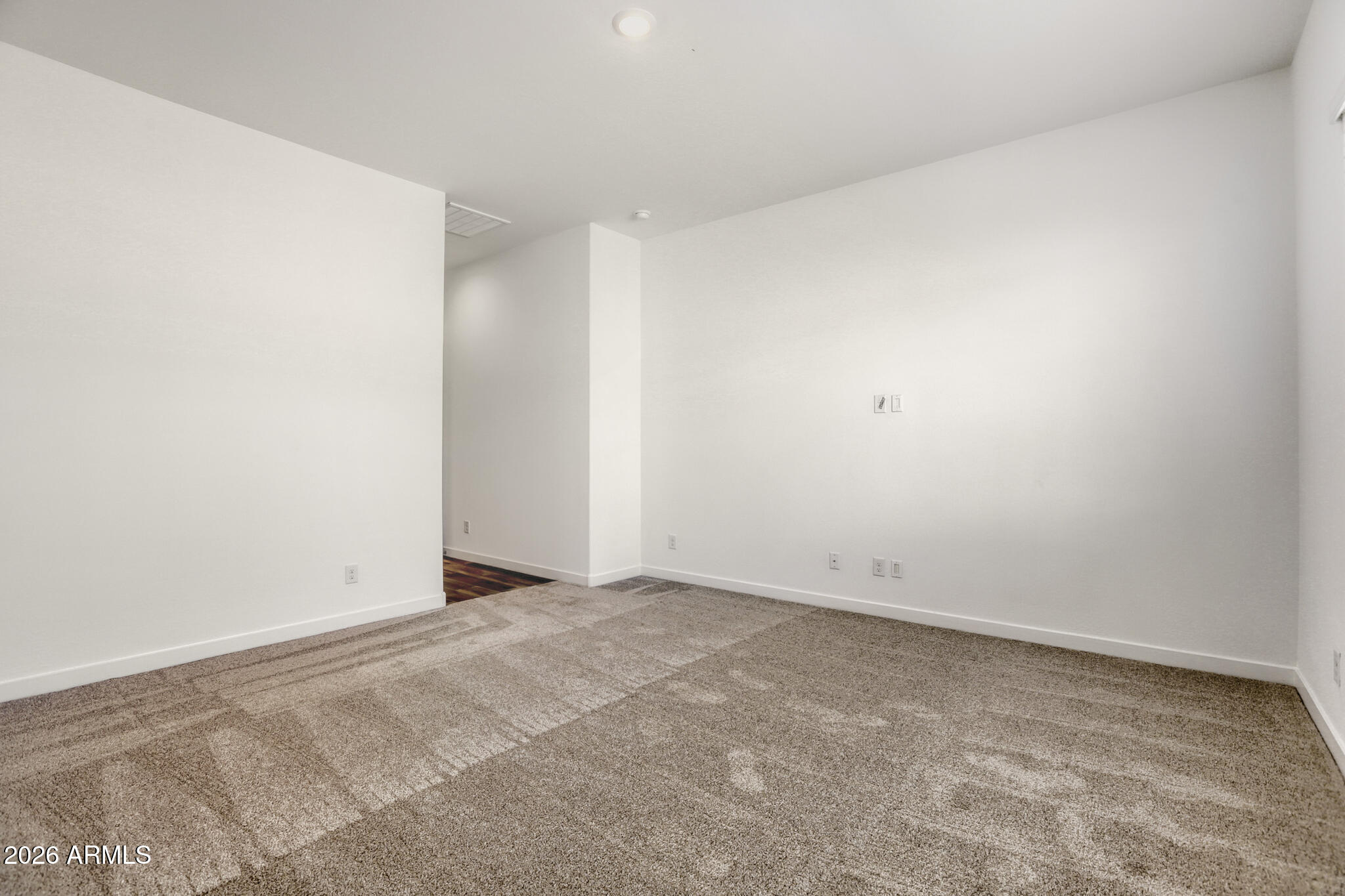 7954 West Rowel Road Peoria, AZ 85383 - Photo 11 of 31 an empty room with an entryway