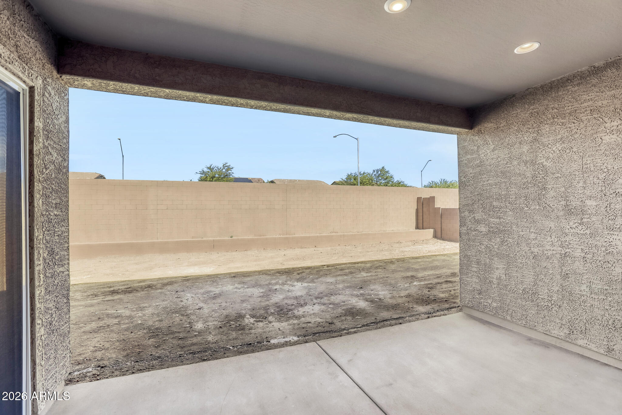7954 West Rowel Road Peoria, AZ 85383 - Photo 25 of 31 a view of kitchen and an empty room