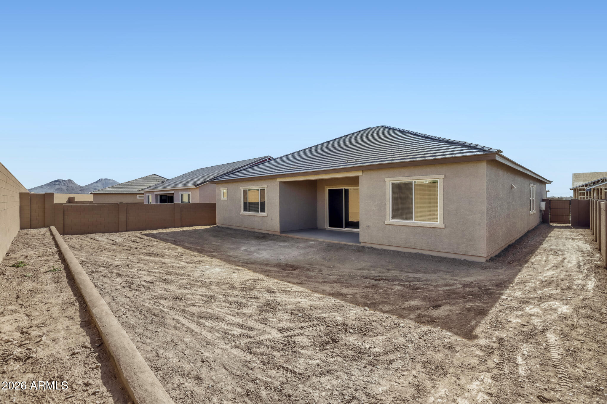 7954 West Rowel Road Peoria, AZ 85383 - Photo 27 of 31 a view of a house with a backyard