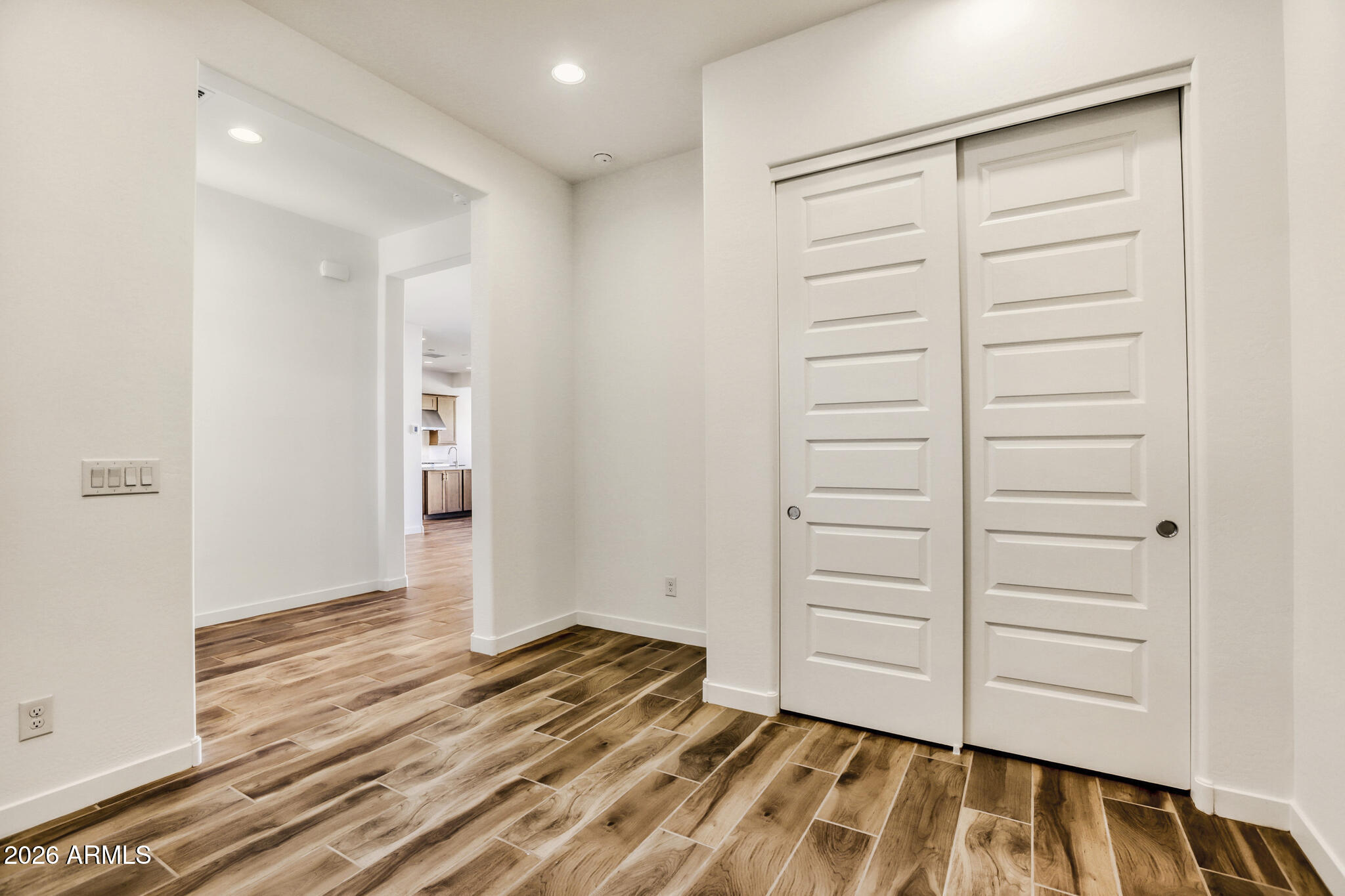 7954 West Rowel Road Peoria, AZ 85383 - Photo 3 of 31 a view of walk in closet with empty racks