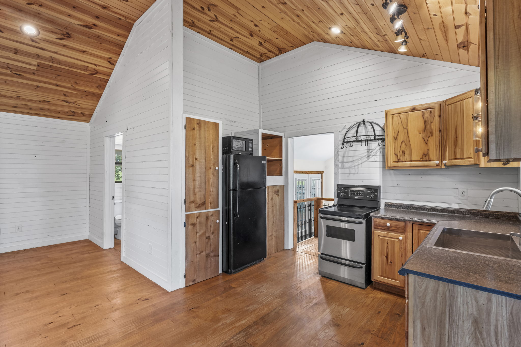 225 Ischar Lane Mason, TX 76856 - Photo 9 of 37 a kitchen that has a refrigerator stove and a sink