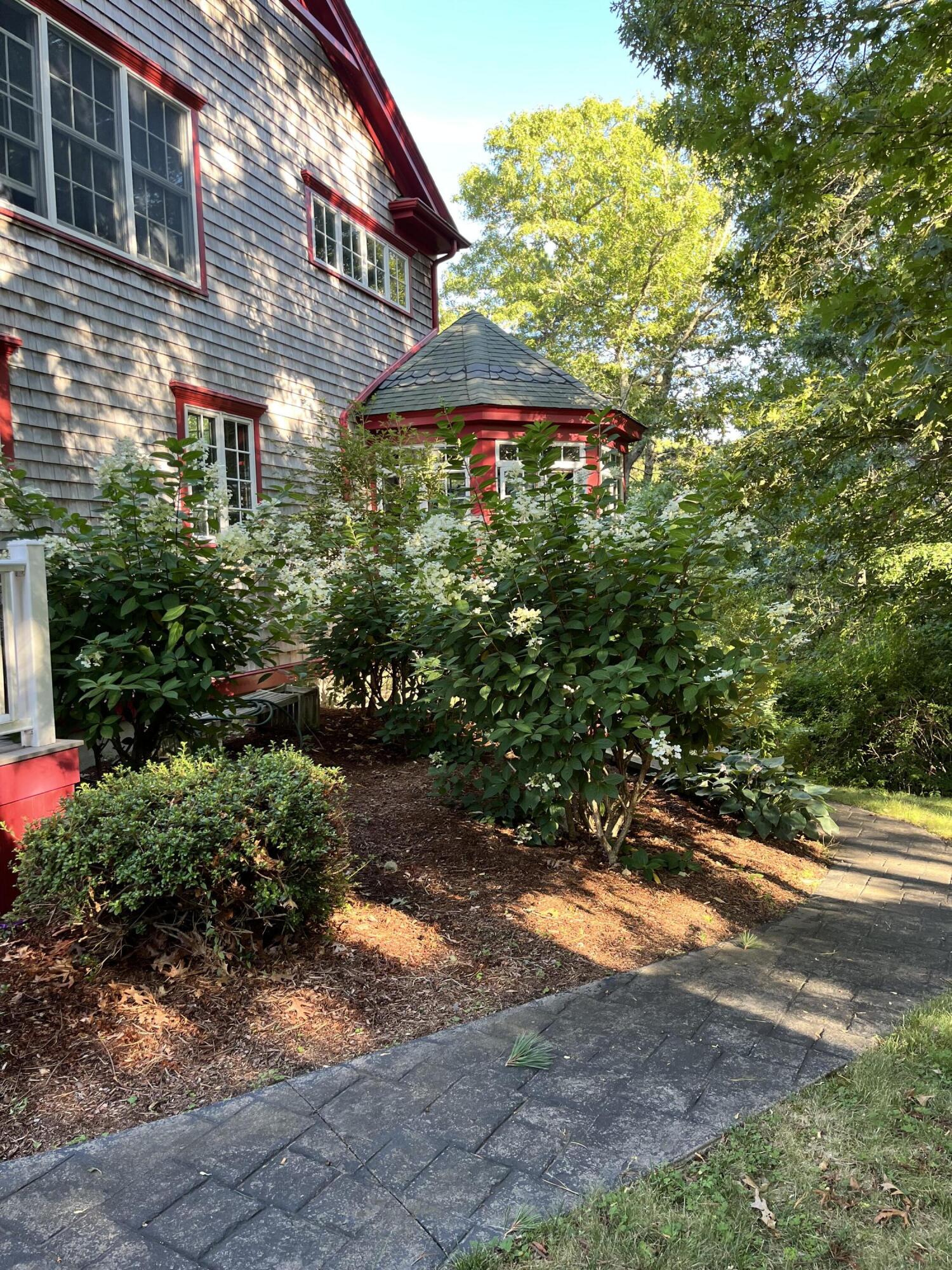 9 Horseshoe Bend Way Mashpee, MA 02649 - Photo 56 of 60 a view of a backyard with plants