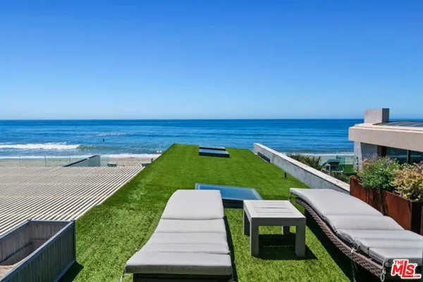 a view of a terrace with a garden