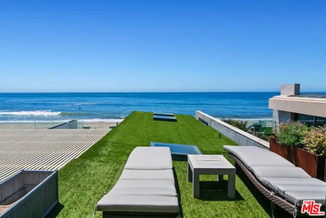 a view of a terrace with a garden