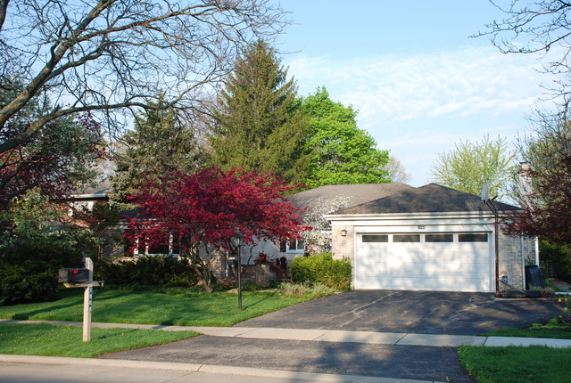 1808 Birch Road Northbrook, IL 60062 - Photo 1 of 24 a view of a house with a yard