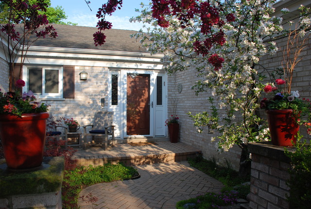 1808 Birch Road Northbrook, IL 60062 - Photo 2 of 24 a view of fountain in front of house