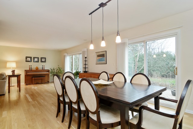 1808 Birch Road Northbrook, IL 60062 - Photo 12 of 24 a dining room with furniture and entryway