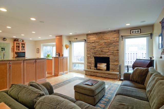 1808 Birch Road Northbrook, IL 60062 - Photo 13 of 24 a living room with furniture and a fireplace