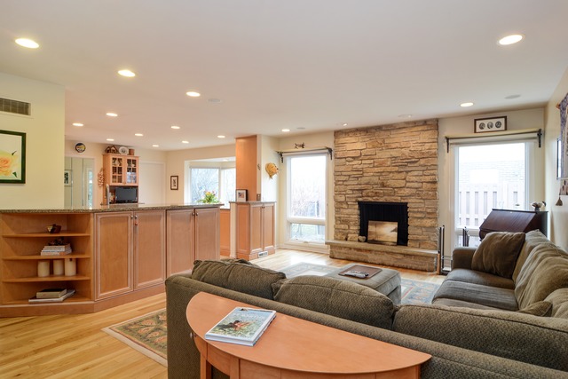 1808 Birch Road Northbrook, IL 60062 - Photo 14 of 24 a living room with furniture and a fireplace