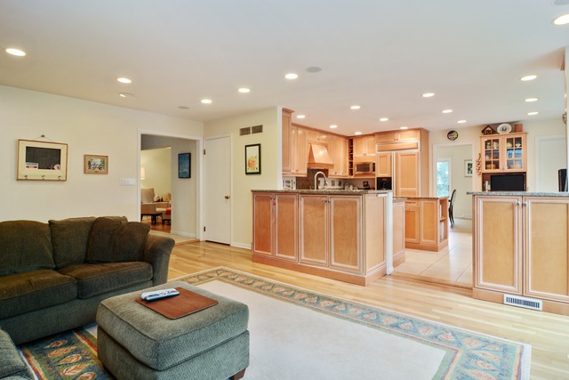 1808 Birch Road Northbrook, IL 60062 - Photo 23 of 24 a living room with furniture and kitchen view