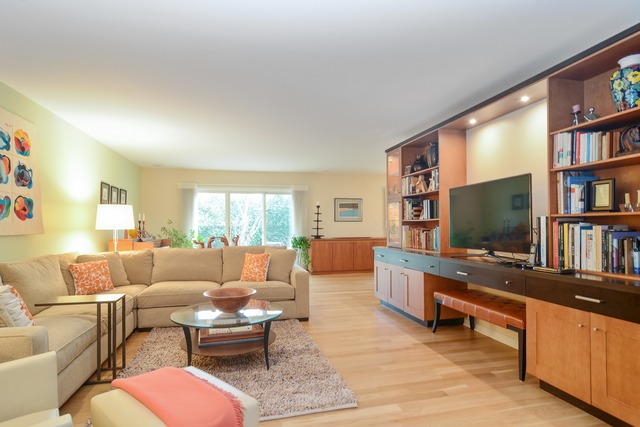 1808 Birch Road Northbrook, IL 60062 - Photo 4 of 24 a living room with furniture and a flat screen tv
