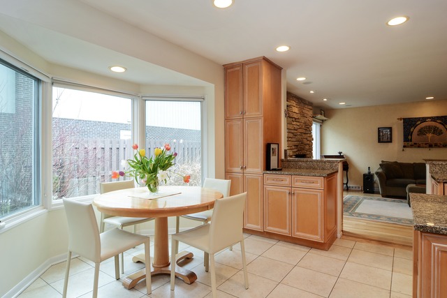 1808 Birch Road Northbrook, IL 60062 - Photo 8 of 24 a kitchen with sink a microwave and cabinets