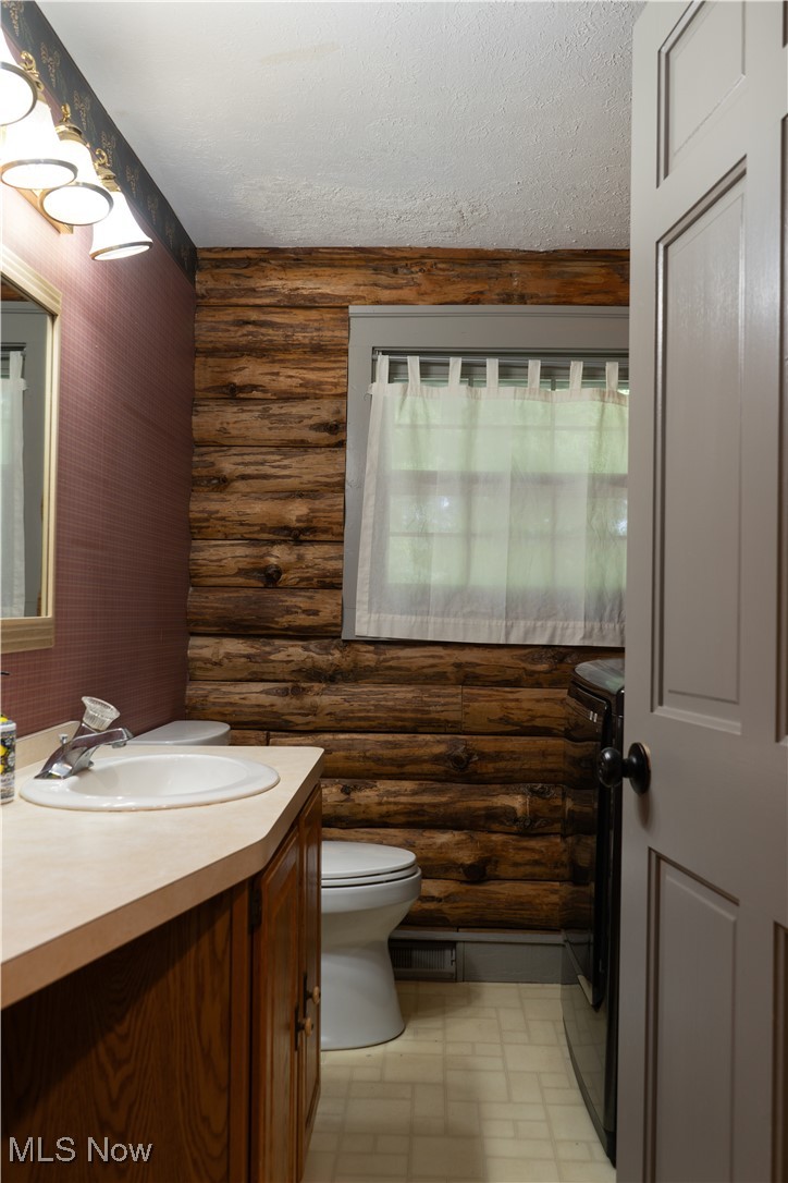 16535 Messenger Road Chagrin Falls, OH 44023 - Photo 15 of 37 First floor half bathroom with new XL washer and dryer