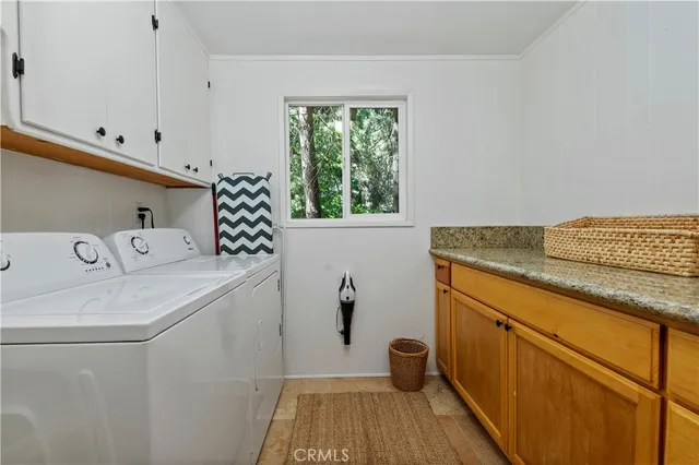 a view of a wooden deck with a patio