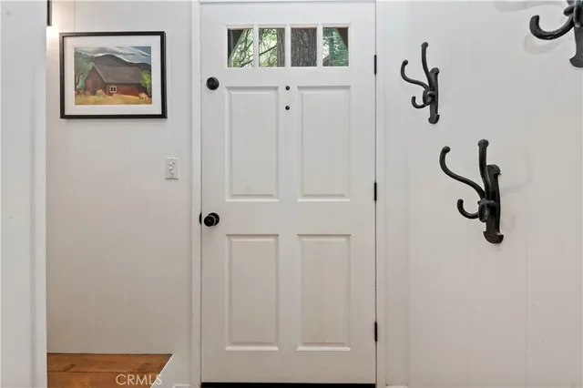 a view of a hallway with white walls