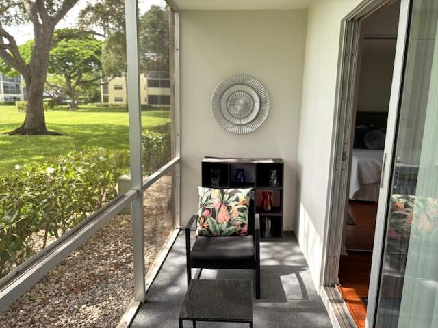7 Dorset A, Unit 7 Boca Raton, FL 33434 - Photo 18 of 20 a view of balcony and furniture