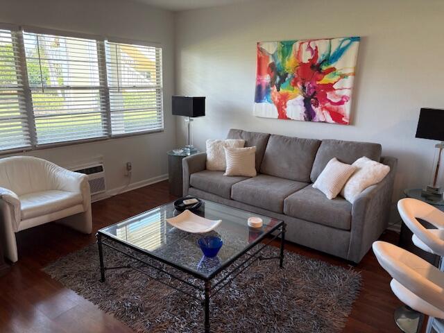 7 Dorset A, Unit 7 Boca Raton, FL 33434 - Photo 6 of 20 a living room with furniture a rug and a window