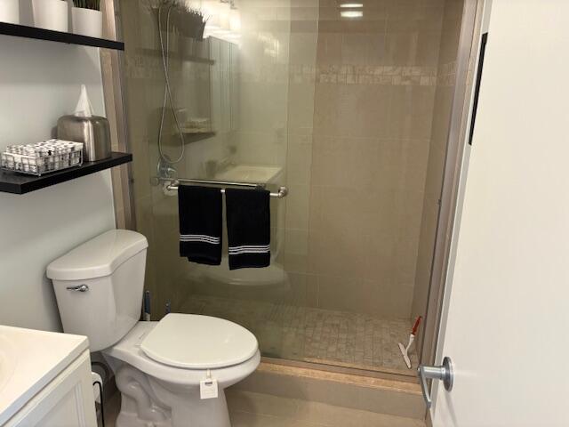 7 Dorset A, Unit 7 Boca Raton, FL 33434 - Photo 10 of 20 a bathroom with a toilet and a shower