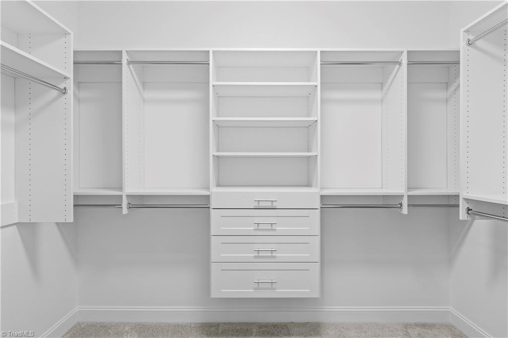 159 Wynnfall Drive Lexington, NC 27295 - Photo 14 of 27 Large Primary Walk In Closet with Built In Shelving System