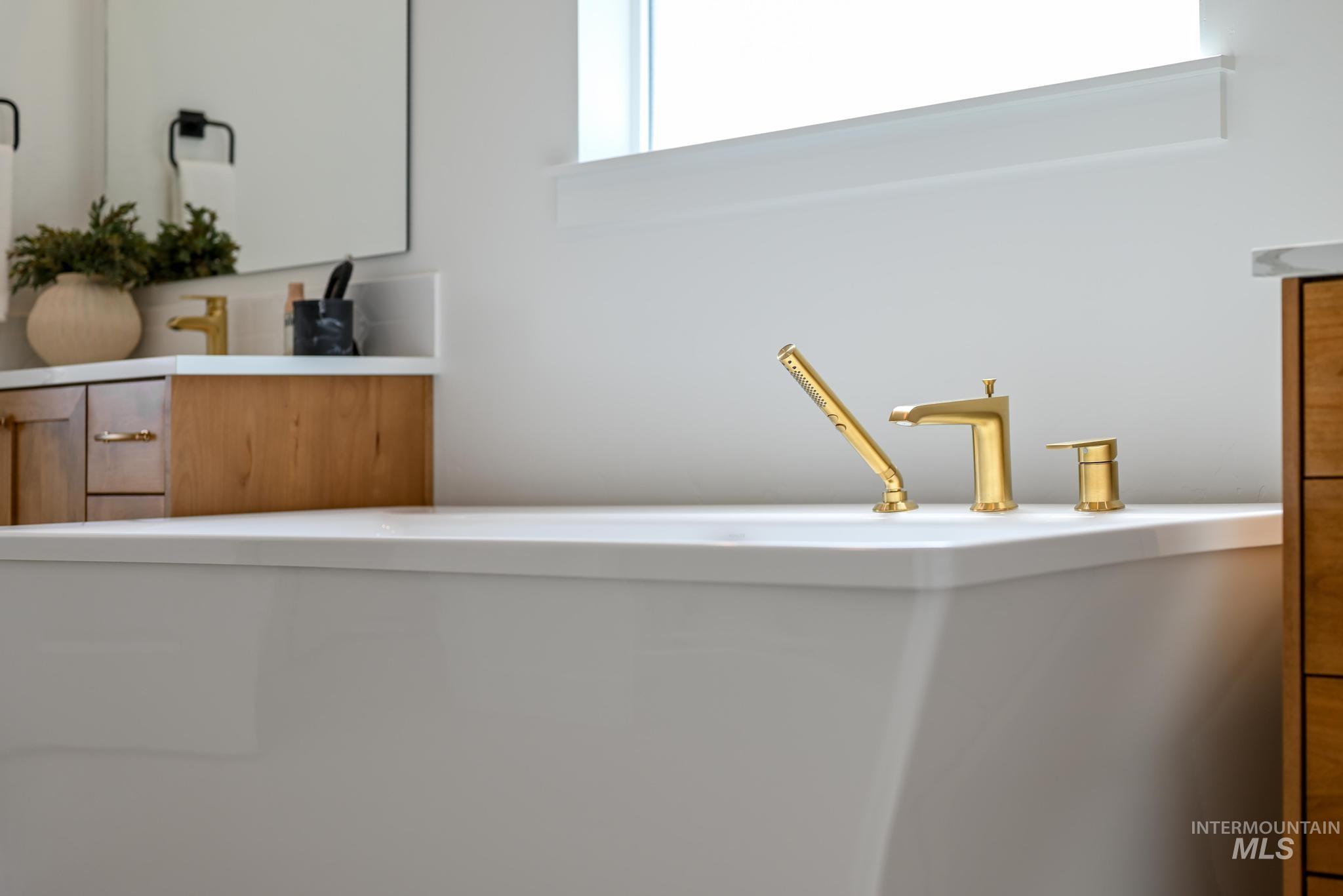 5407 Sparky Avenue Caldwell, ID 83607 - Photo 21 of 41 Bathroom view of a freestanding bath and vanity