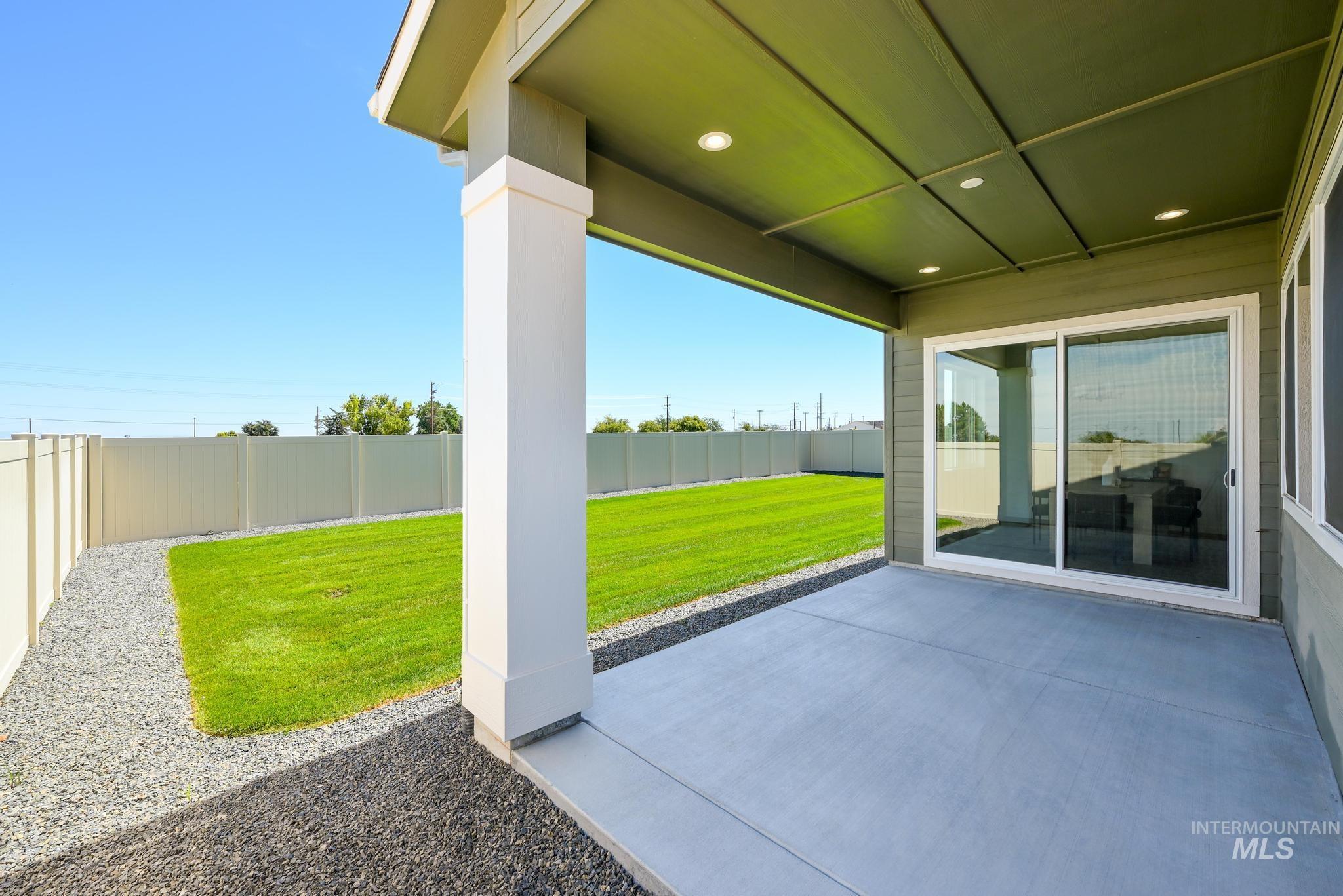 5407 Sparky Avenue Caldwell, ID 83607 - Photo 32 of 41 Fenced backyard featuring a patio area