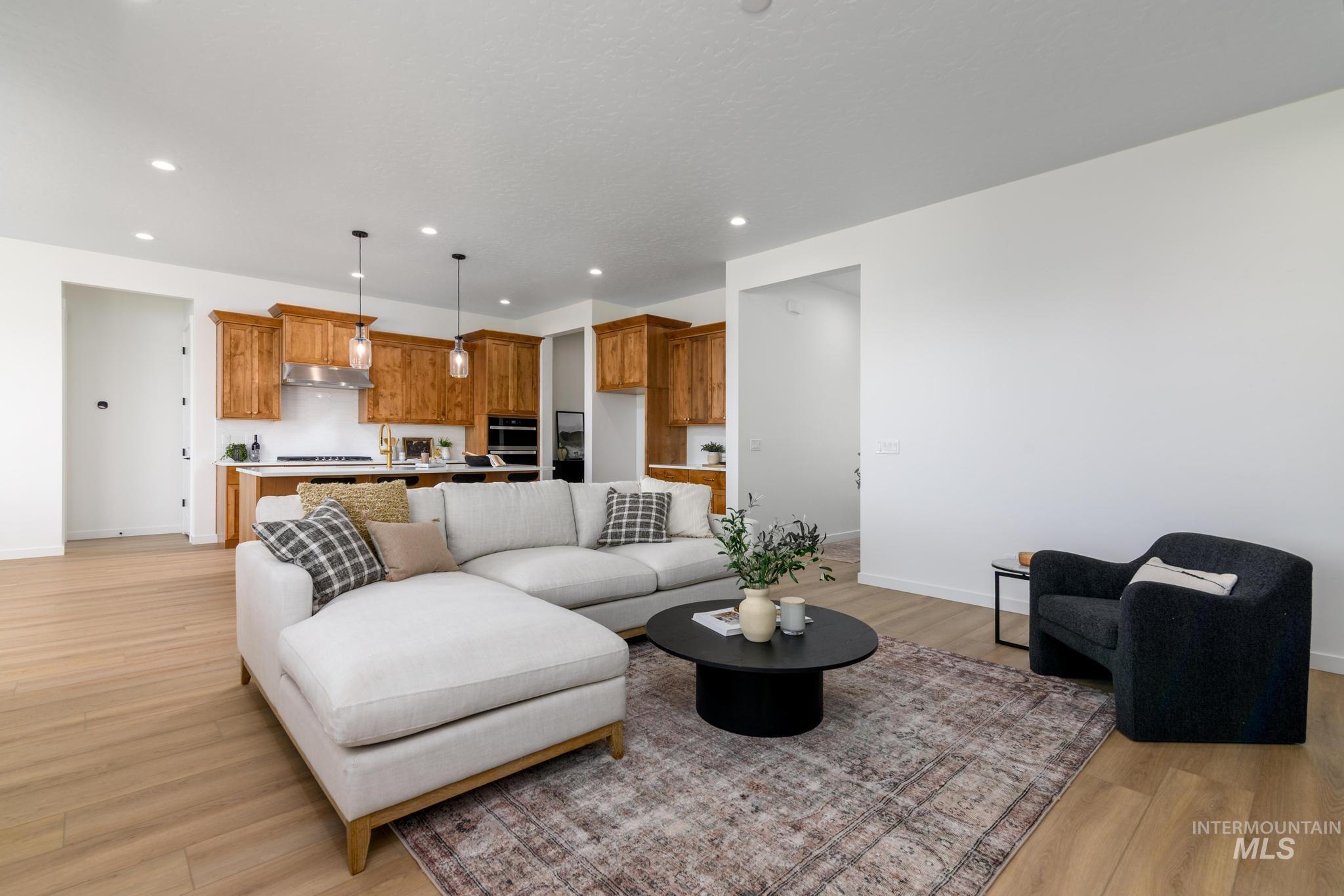 5407 Sparky Avenue Caldwell, ID 83607 - Photo 8 of 41 Living area with recessed lighting and light wood-type flooring