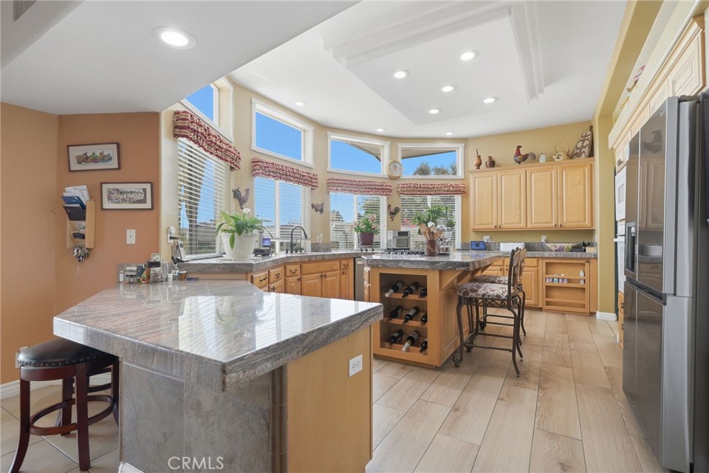 35780 Greer Road Murrieta, CA 92562 - Photo 8 of 56 Alternate view of kitchen showing breakfast bar