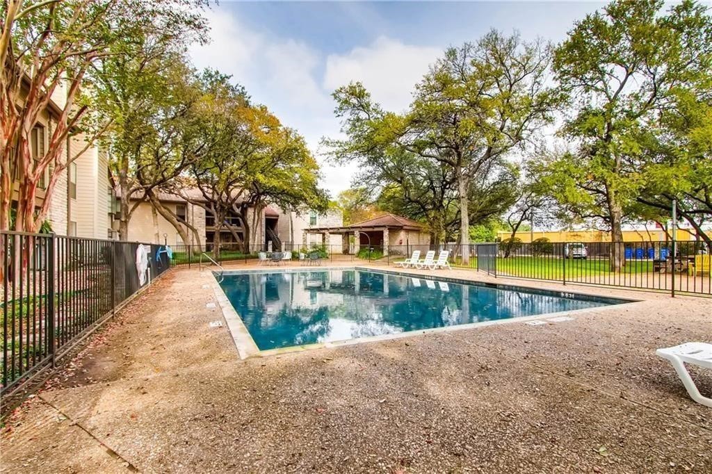 8600 Fathom Circle, Unit 1408 Austin, TX 78750 - Photo 14 of 17 a view of a house with a park