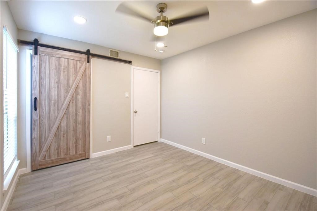 8600 Fathom Circle, Unit 1408 Austin, TX 78750 - Photo 8 of 17 a view of entryway with wooden floor