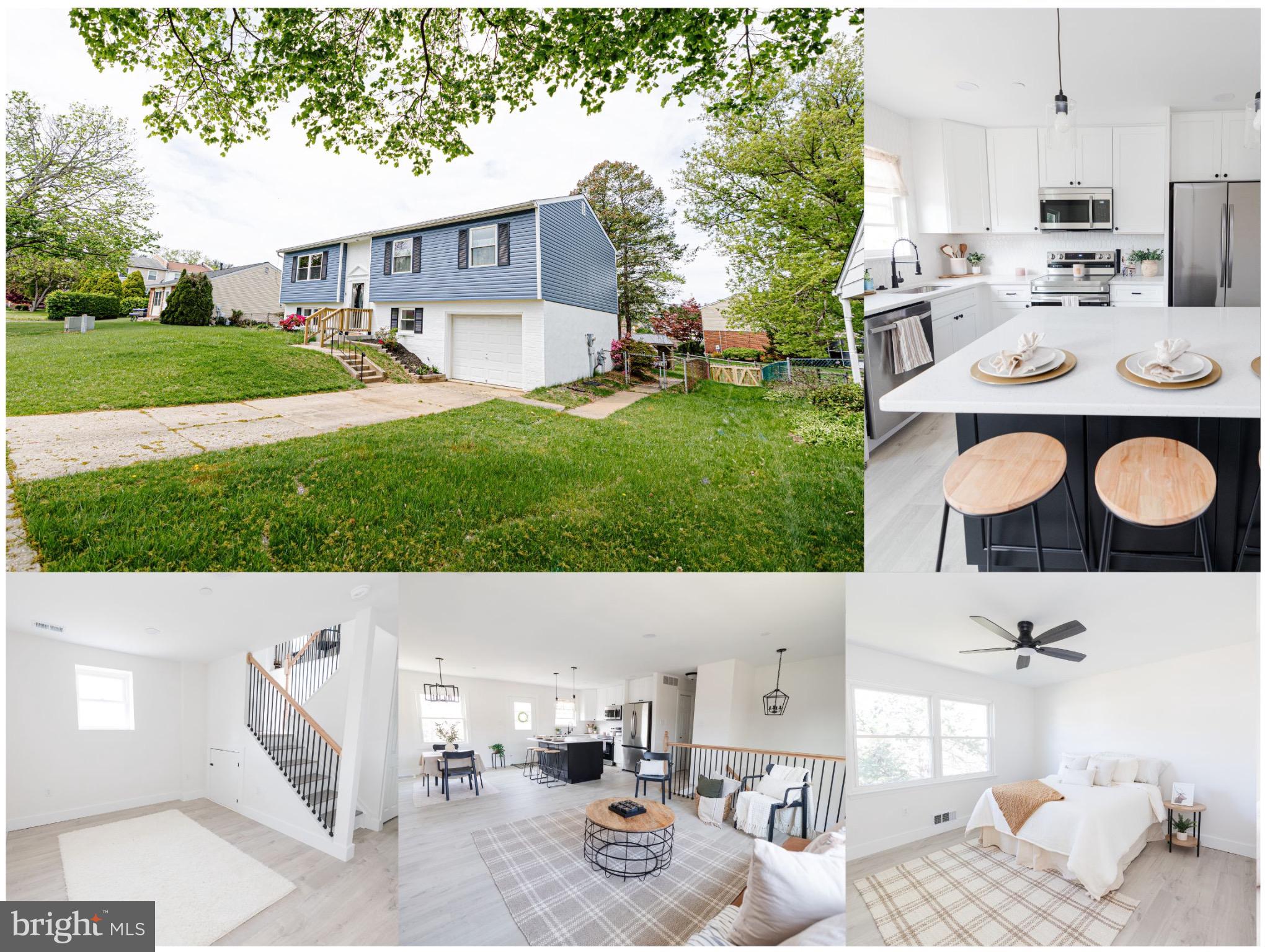 a view of open kitchen with kitchen island and trees