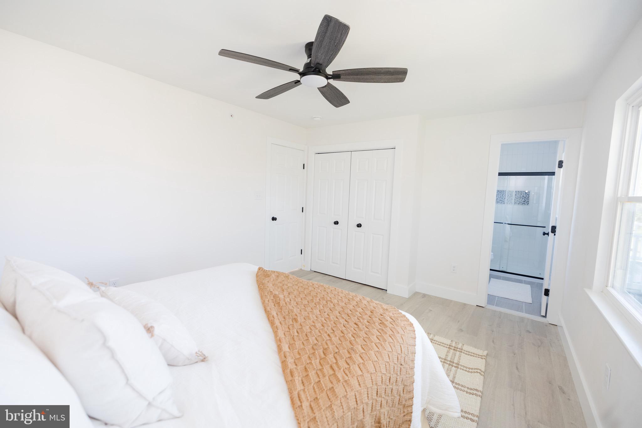6 Valley Bend Road Westminster, MD 21157 - Photo 22 of 41 a bedroom with a bed and a ceiling fan