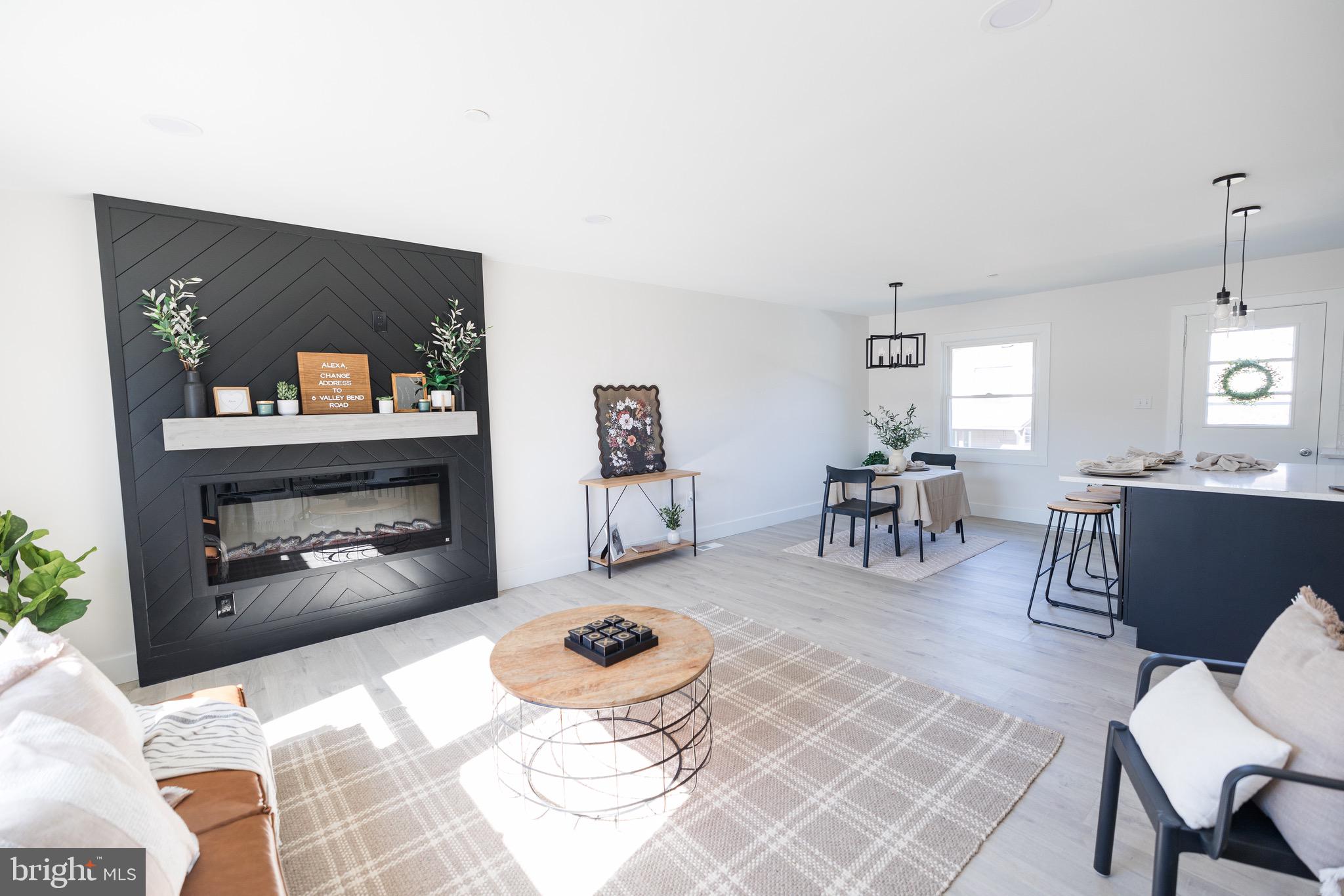 6 Valley Bend Road Westminster, MD 21157 - Photo 3 of 41 a living room with furniture and a fireplace