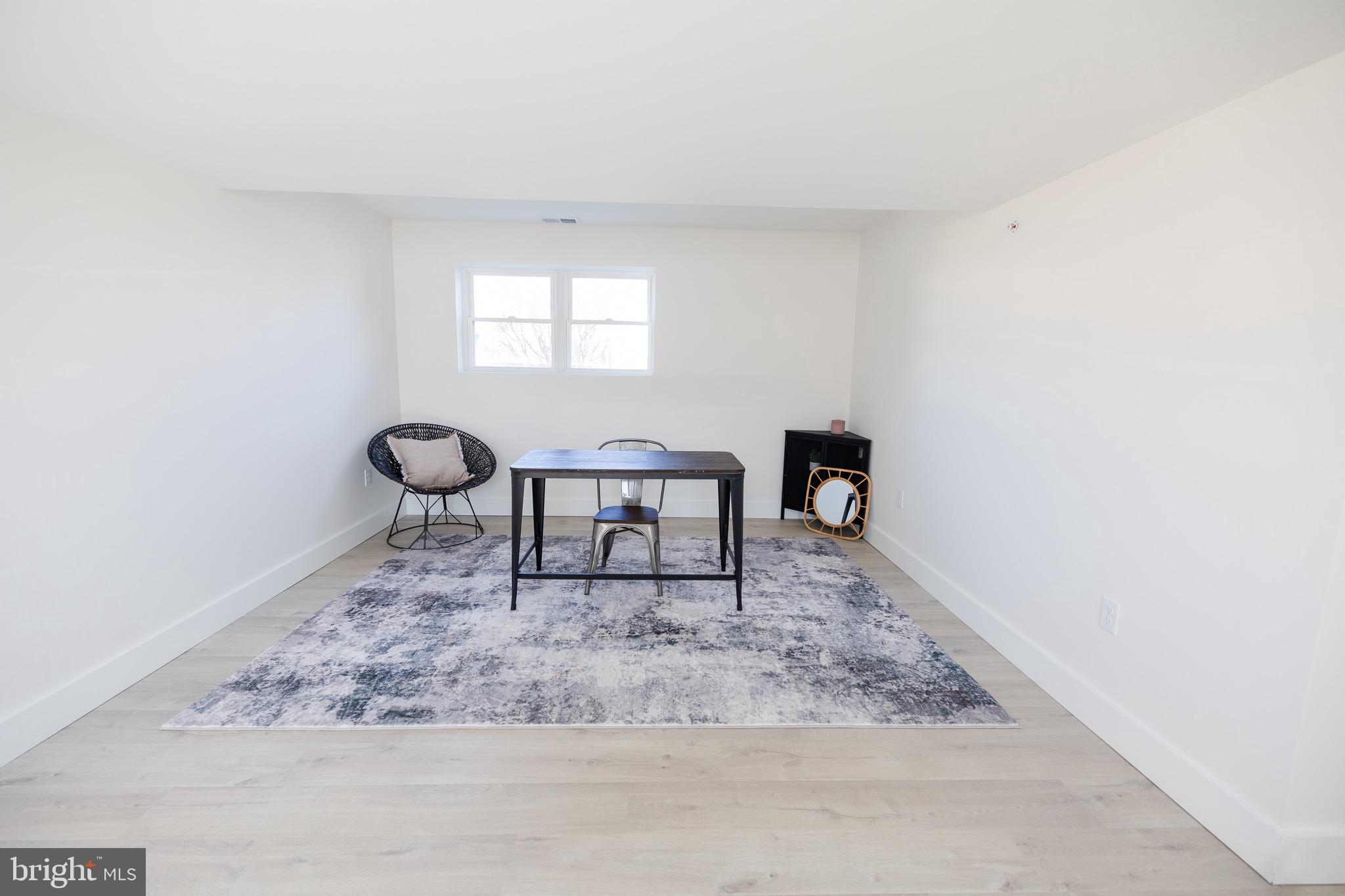 6 Valley Bend Road Westminster, MD 21157 - Photo 34 of 41 a view of a livingroom with wooden floor and a window