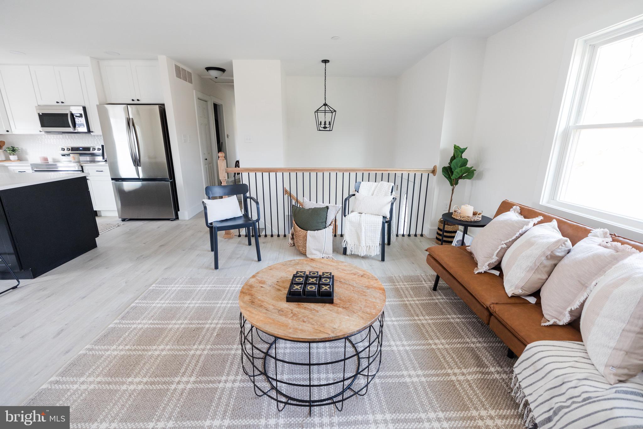 6 Valley Bend Road Westminster, MD 21157 - Photo 5 of 41 a living room with furniture and a window