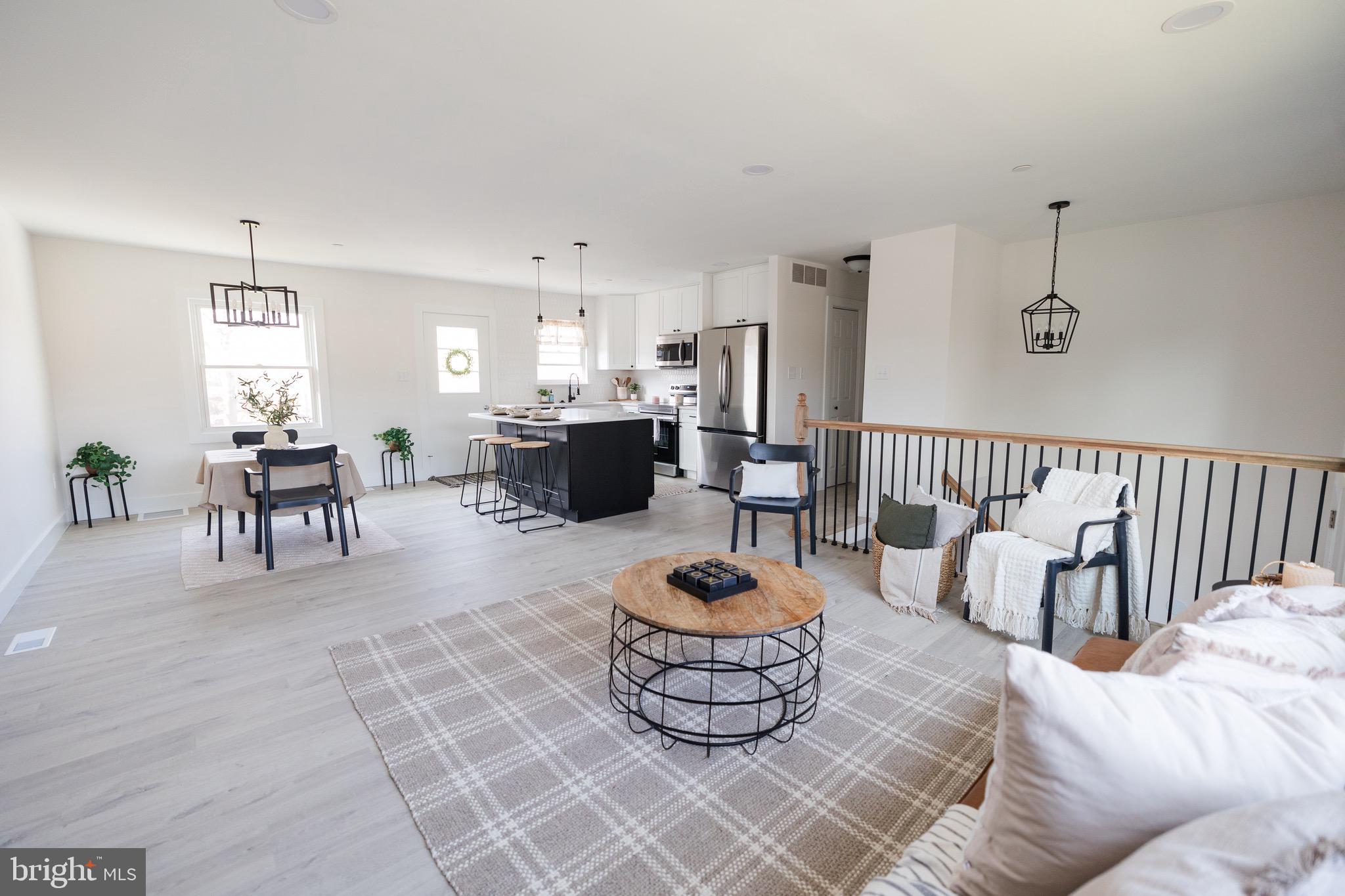 6 Valley Bend Road Westminster, MD 21157 - Photo 7 of 41 a living room with furniture and a wooden floor