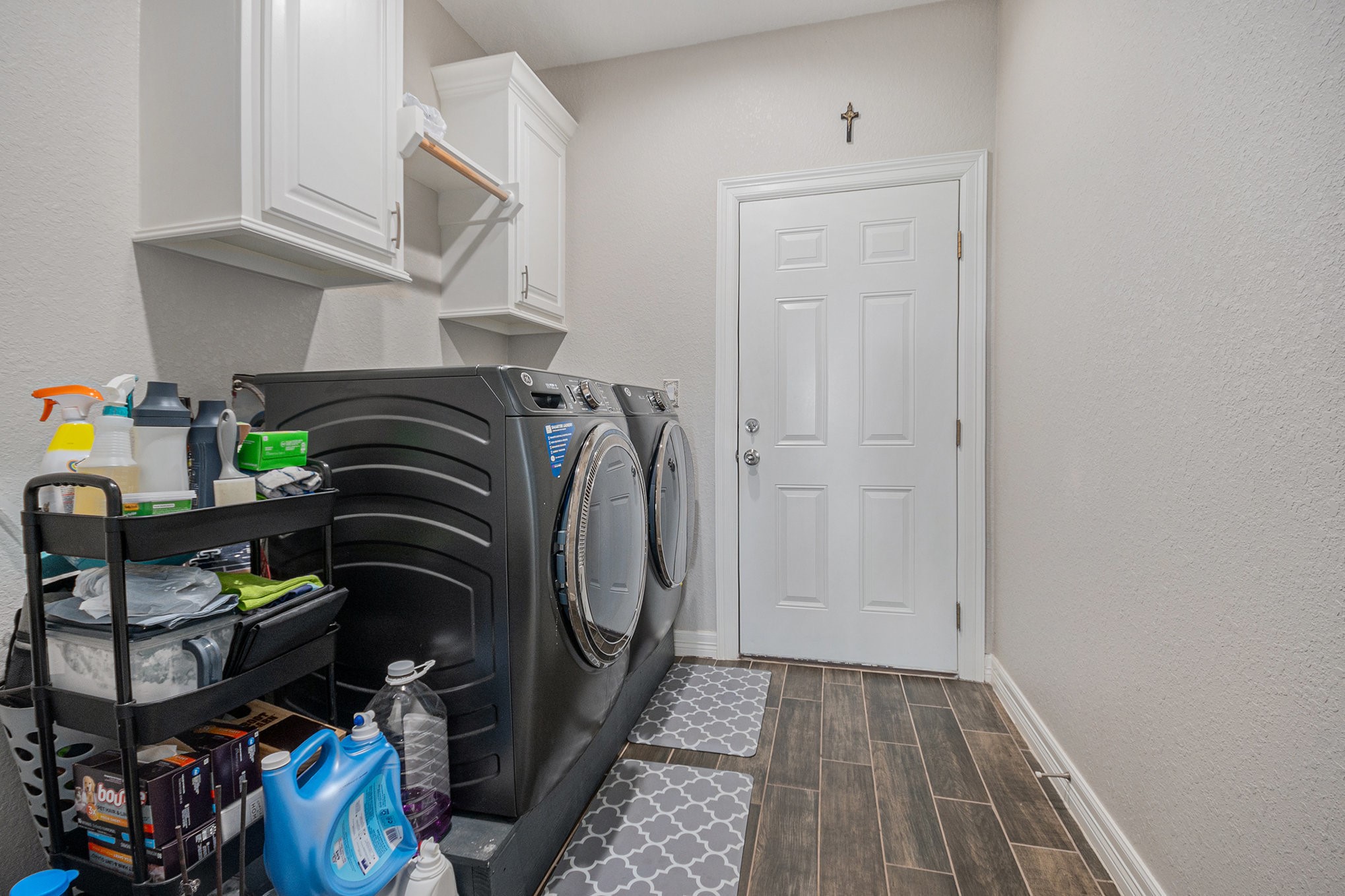 489 Sunset Trail Angleton, TX 77515 - Photo 19 of 39 a utility room with dryer and washer