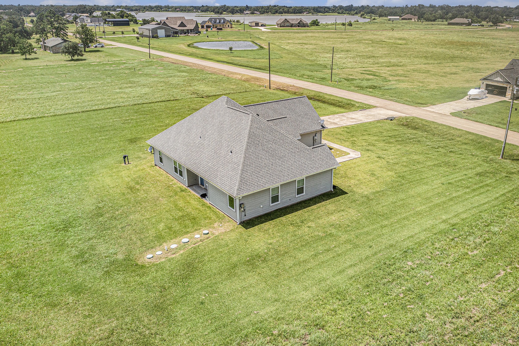 489 Sunset Trail Angleton, TX 77515 - Photo 23 of 39 a view of a swimming pool and an outdoor space