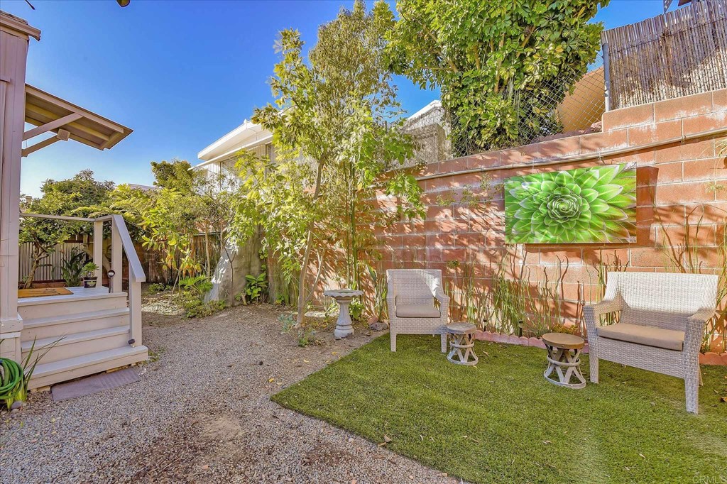 151 Falls View Lane Oceanside, CA 92056 - Photo 26 of 34 Sitting area behind the carport.