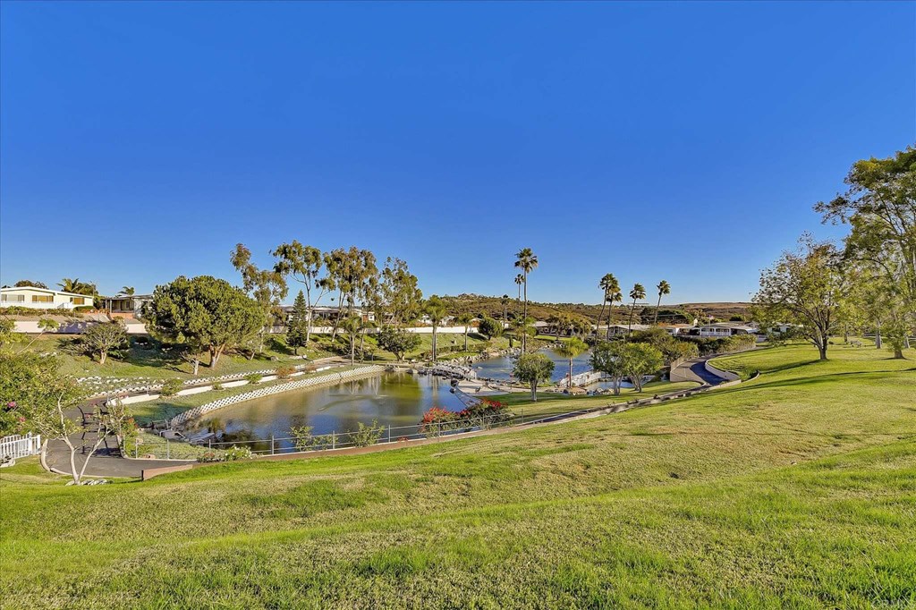 151 Falls View Lane Oceanside, CA 92056 - Photo 30 of 34 Lake area with walking trail.