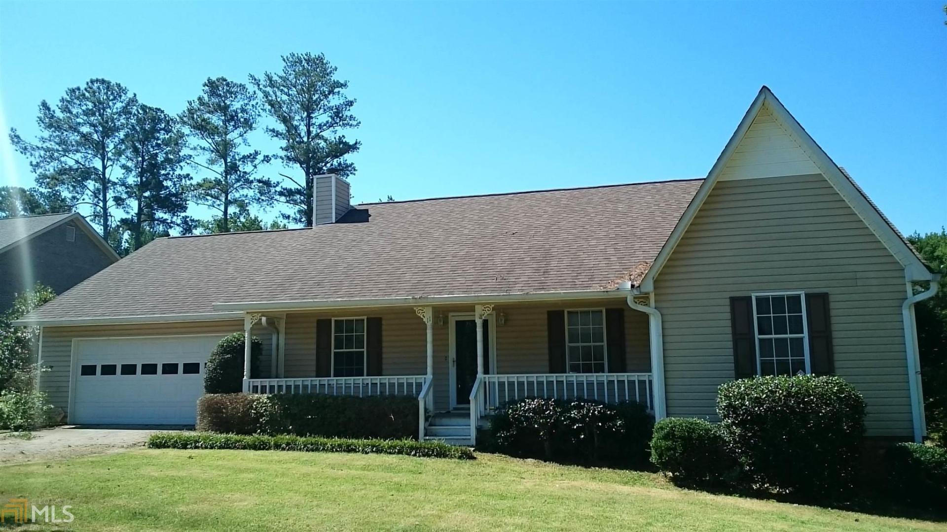 11 Lucas Lane Southwest, Unit 202 Rome, GA 30165 - Photo 1 of 1 a front view of a house with garden