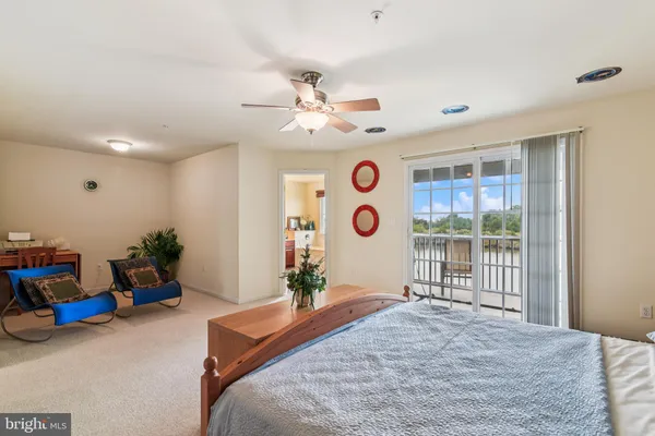 a bedroom with two beds and a window